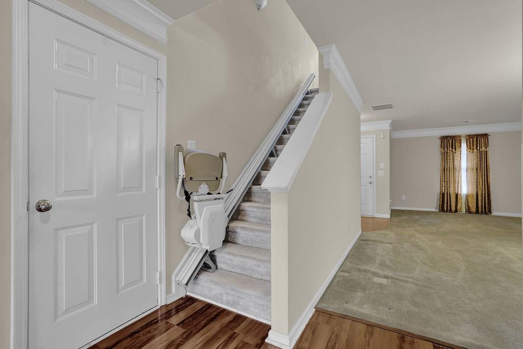 3160 Centerglen Lane Cumming, GA 30040 - Photo 17 of 40 a view of a hallway with staircase
