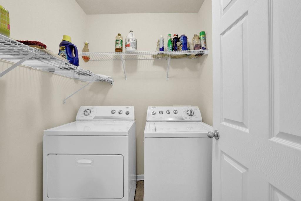 3160 Centerglen Lane Cumming, GA 30040 - Photo 26 of 40 a utility room with dryer and washer