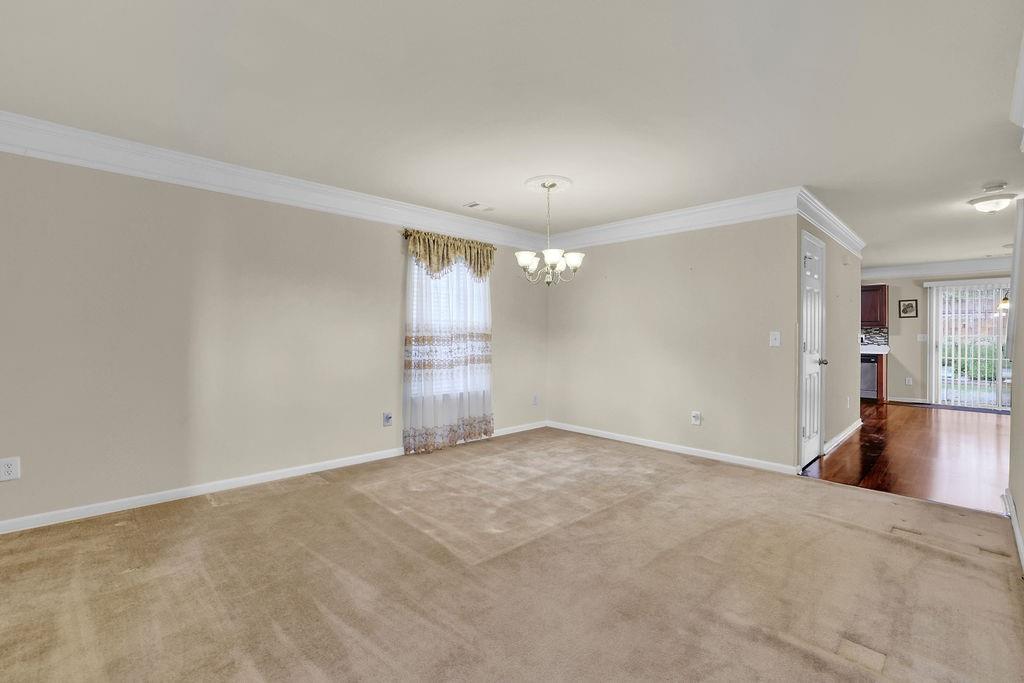 3160 Centerglen Lane Cumming, GA 30040 - Photo 8 of 40 a view of empty room with wooden floor