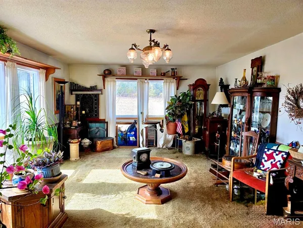 $299,900 | 411 Craig Lane, Raymondville, MO 65555