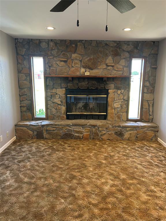 401 South Ave H Olney, TX 76374 - Photo 17 of 22 a view of a livingroom with a fireplace