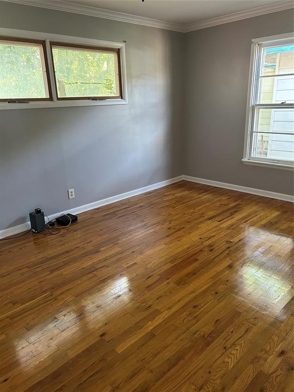 401 South Ave H Olney, TX 76374 - Photo 21 of 22 en empty room with window