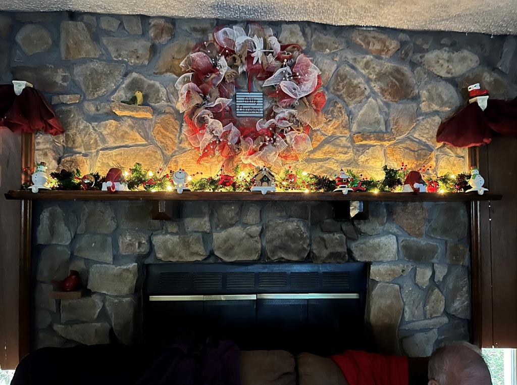 401 South Ave H Olney, TX 76374 - Photo 5 of 22 a room with lots of different colored cloths