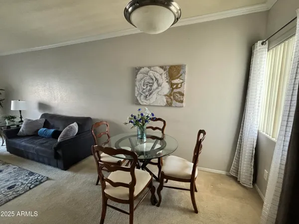 a kitchen with stainless steel appliances granite countertop a sink a stove and a cabinets