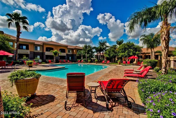 a backyard of a house with seating space