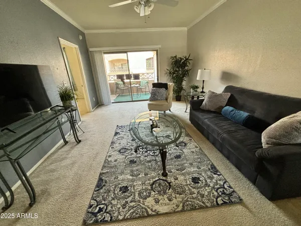a living room with furniture and a window