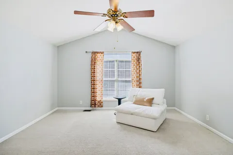 an empty room with wooden floor