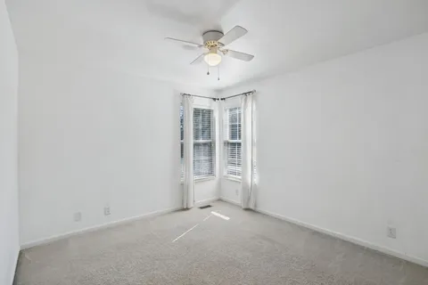 a view of yard with swimming pool