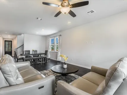 a bathroom with a sink toilet and a mirror