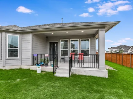 a bathroom with a sink a mirror and a bathtub