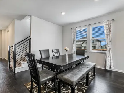 a kitchen with stainless steel appliances granite countertop a sink and stove