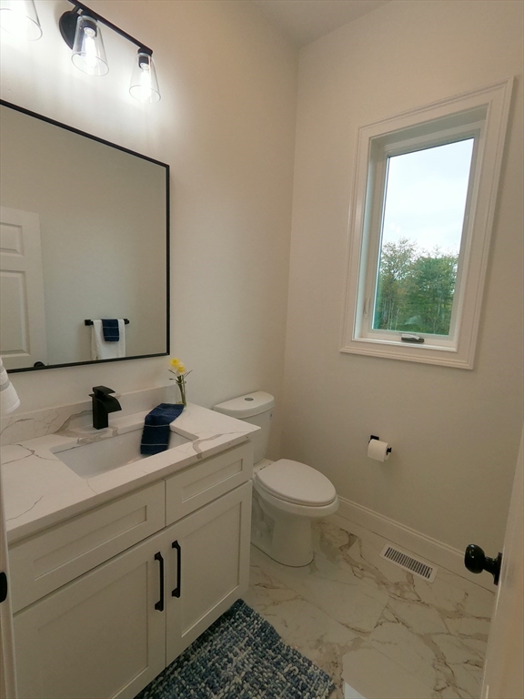 86 Berry Corner Road Charlton, MA 01507 - Photo 17 of 41 a bathroom with a sink toilet and mirror
