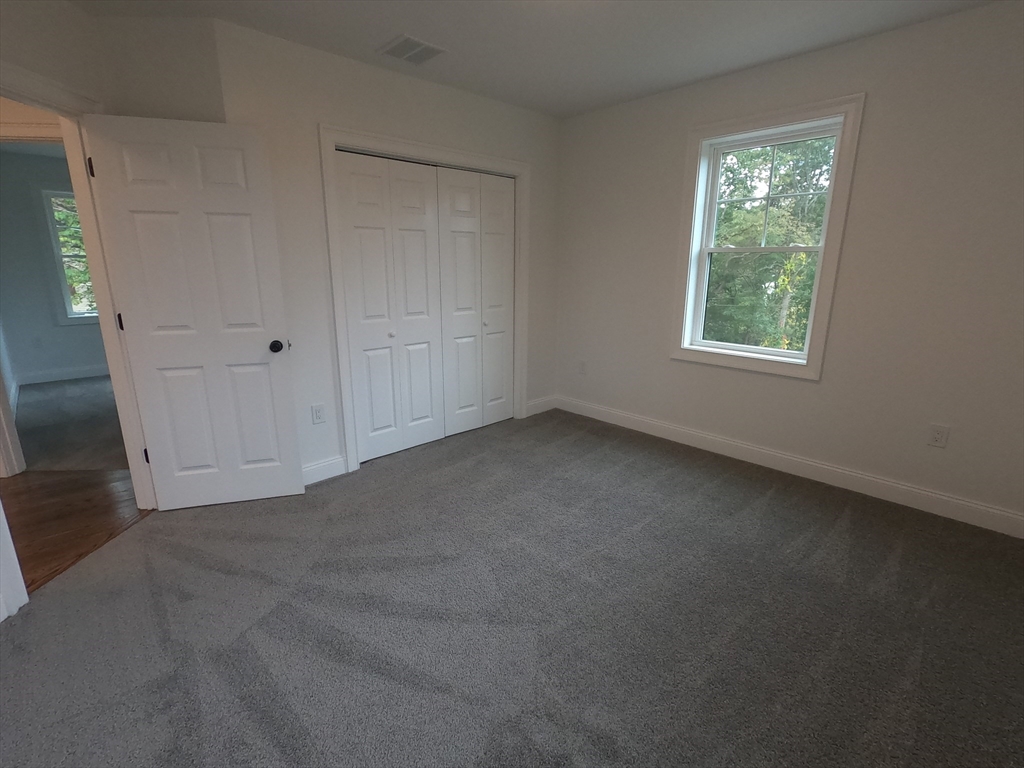 86 Berry Corner Road Charlton, MA 01507 - Photo 26 of 41 a view of a room that has a window in it