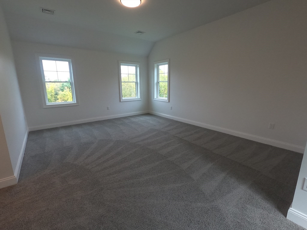 86 Berry Corner Road Charlton, MA 01507 - Photo 38 of 41 an empty room with windows
