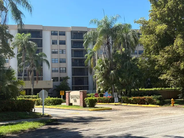 a tall building sitting on the side of a road
