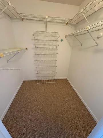 a view of a room with racks on the wall