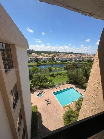 a view of a balcony with an ocean view