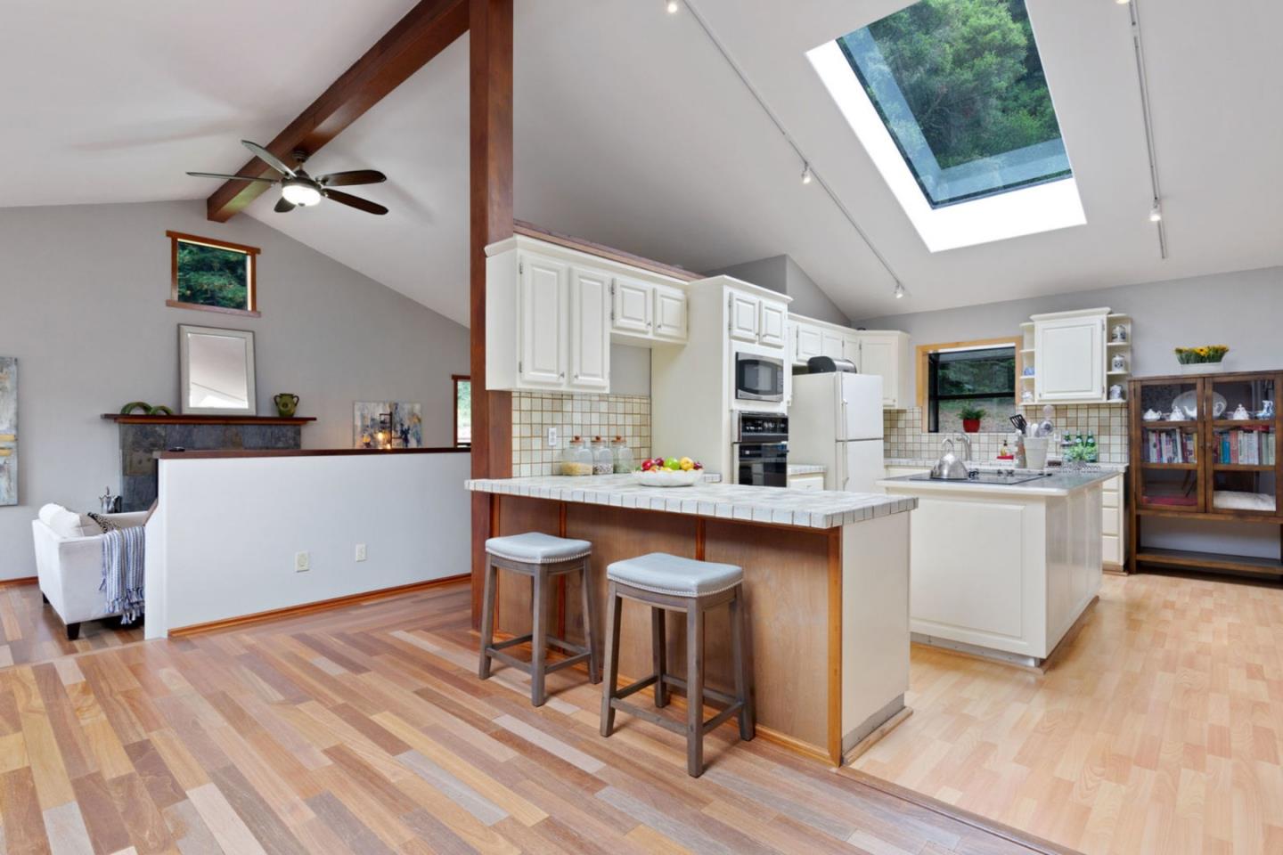 2060 Sparrow Valley Road Aptos, CA 95003 - Photo 12 of 45 a kitchen with a sink cabinets and window