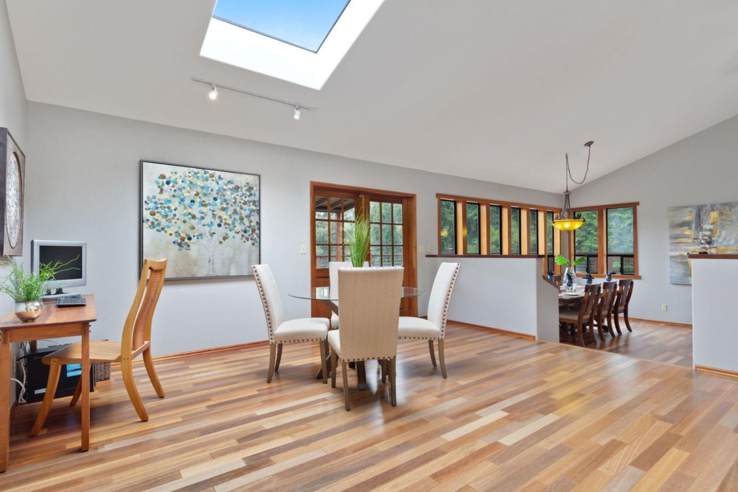2060 Sparrow Valley Road Aptos, CA 95003 - Photo 16 of 45 a view of a dining room with furniture window and wooden floor