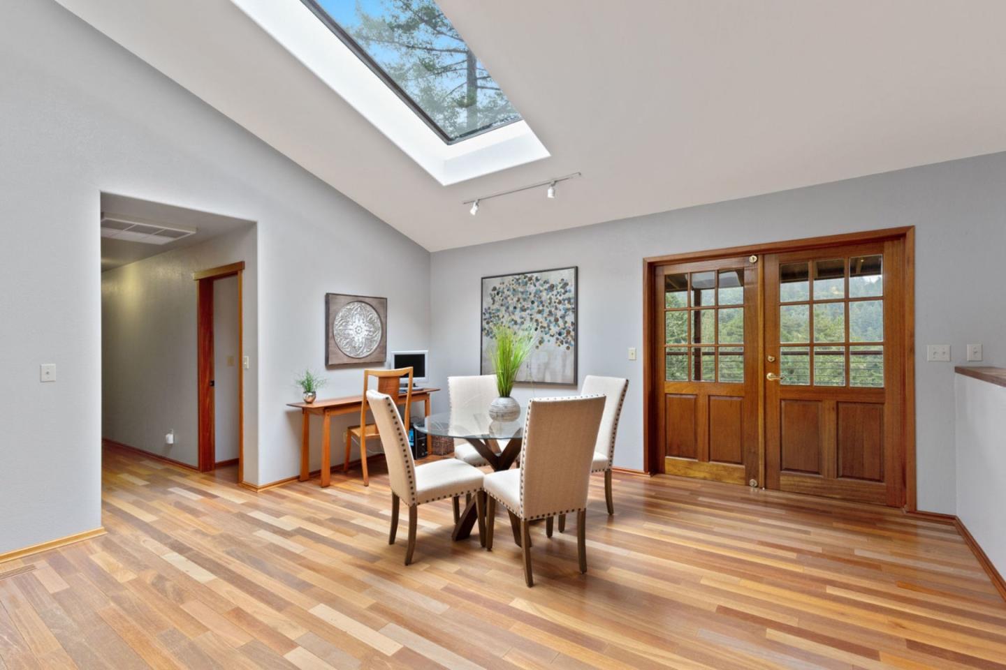 2060 Sparrow Valley Road Aptos, CA 95003 - Photo 18 of 45 a view of a dining room with furniture window and wooden floor