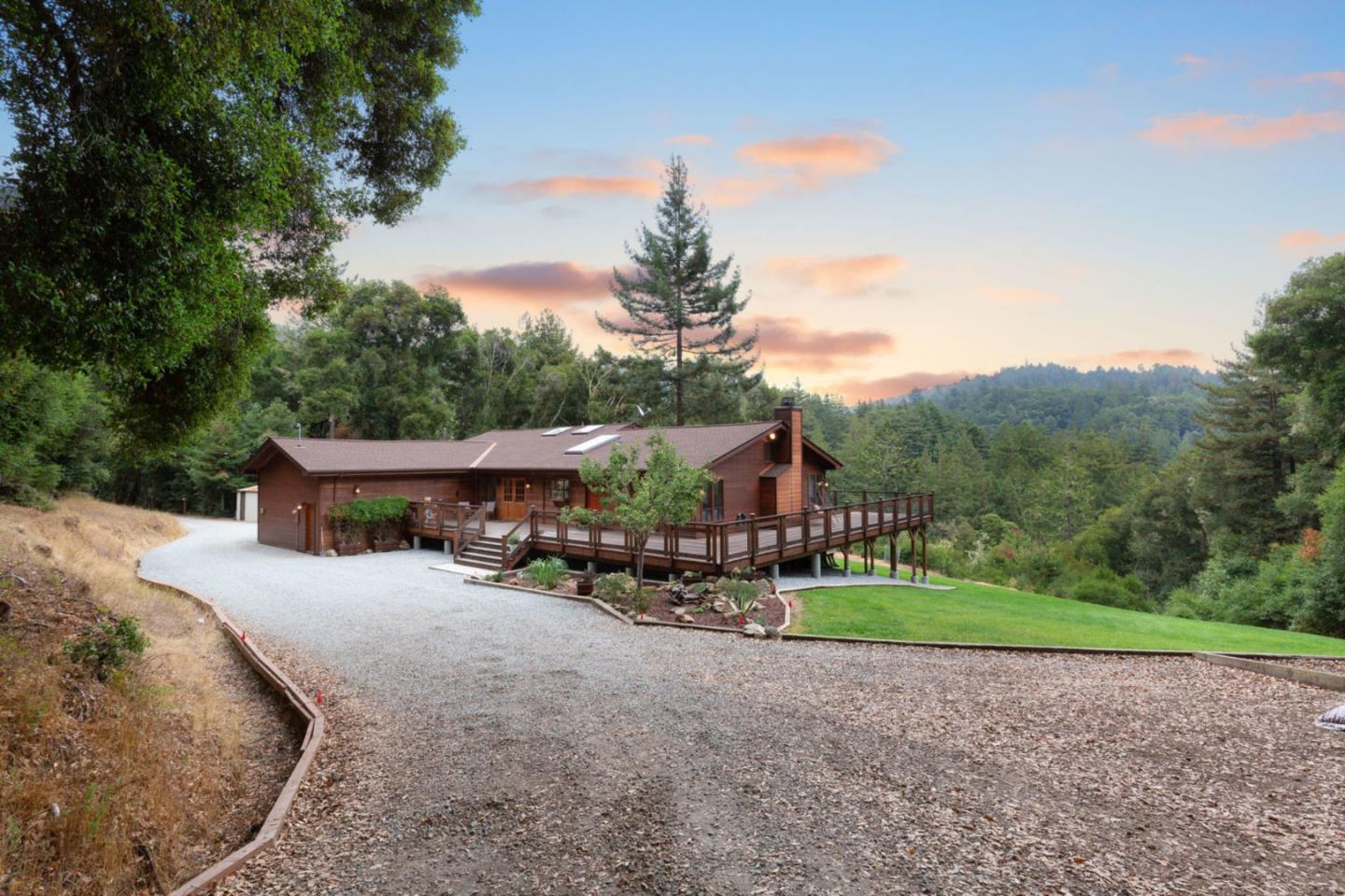 2060 Sparrow Valley Road Aptos, CA 95003 - Photo 2 of 45 a view of a house with a yard and potted plants