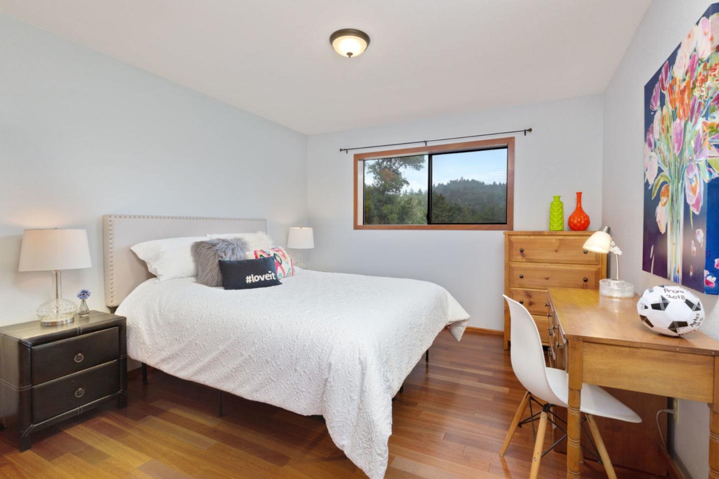 2060 Sparrow Valley Road Aptos, CA 95003 - Photo 25 of 45 a bedroom with a bed and a table in it