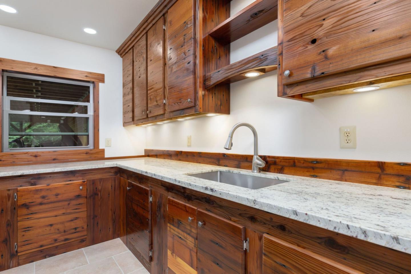 2060 Sparrow Valley Road Aptos, CA 95003 - Photo 33 of 45 a kitchen with granite countertop stainless steel appliances sink and cabinets