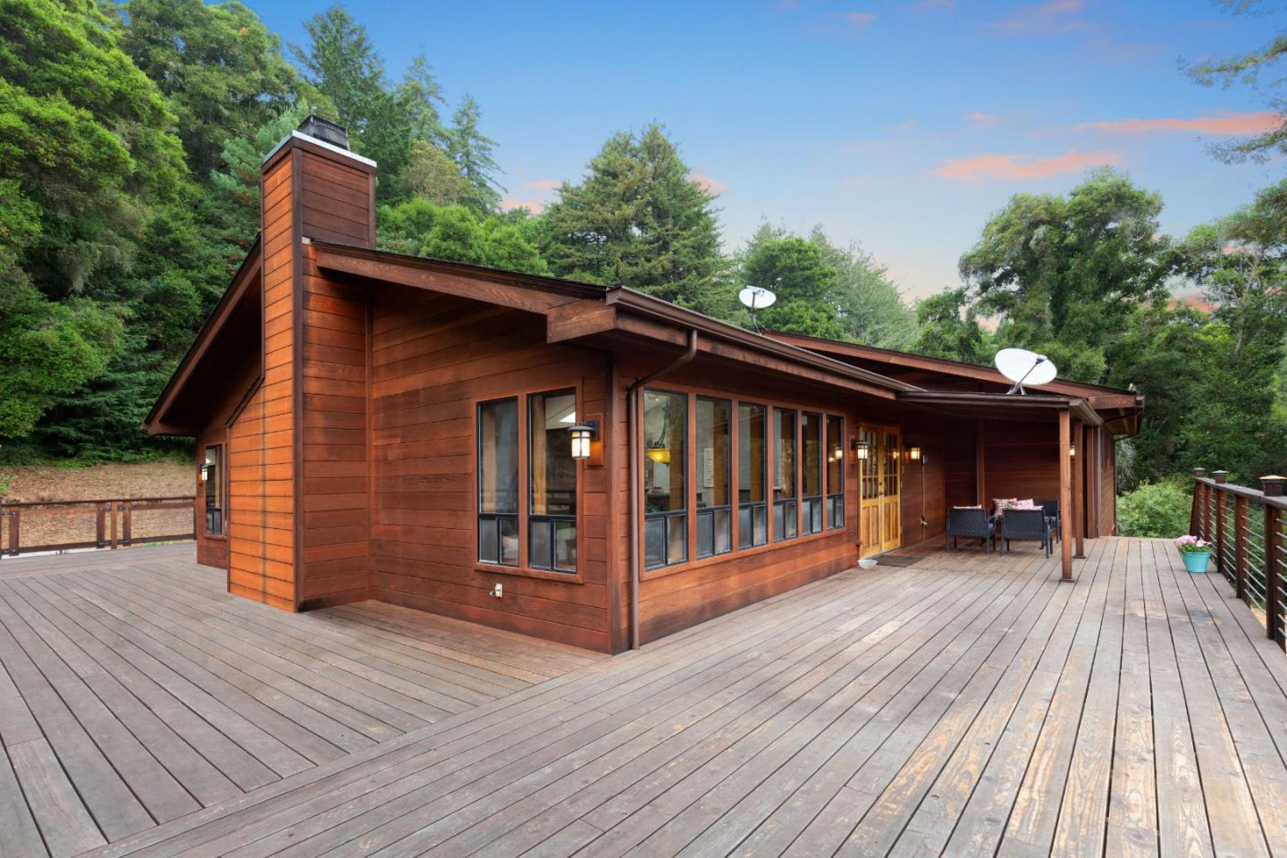 2060 Sparrow Valley Road Aptos, CA 95003 - Photo 4 of 45 a view of a house with wooden deck and furniture