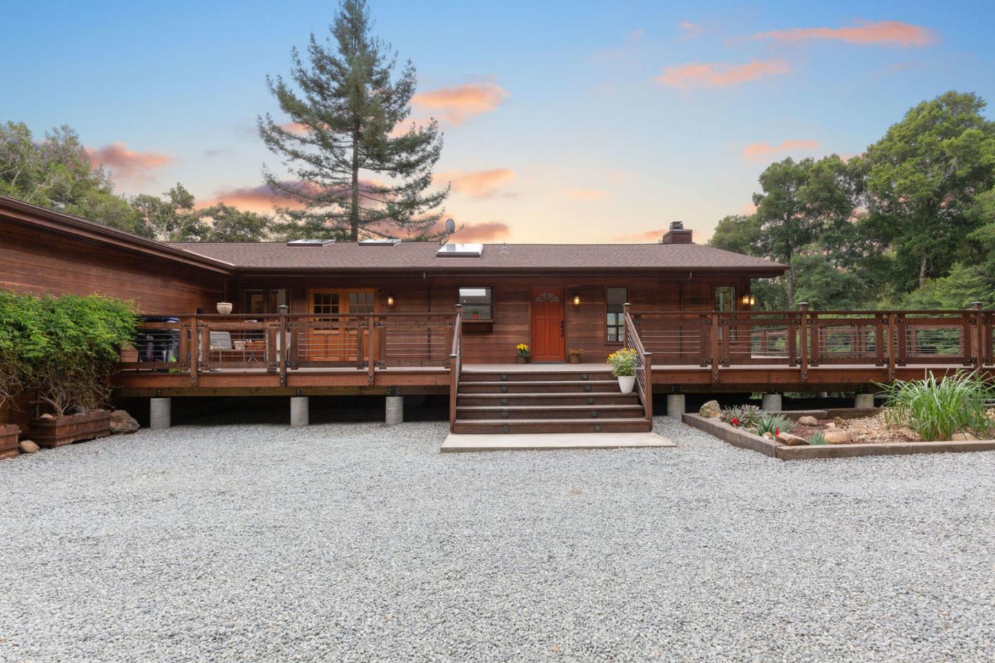 2060 Sparrow Valley Road Aptos, CA 95003 - Photo 41 of 45 a view of a chairs and tables in the back yard of the house