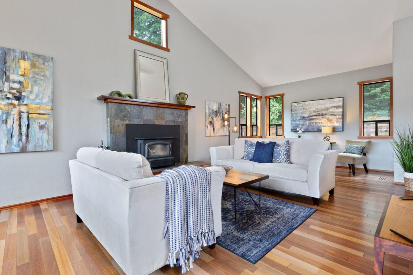 2060 Sparrow Valley Road Aptos, CA 95003 - Photo 8 of 45 a living room with fireplace furniture and a wooden floor