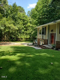 3109 Manor Ridge Drive Raleigh, NC 27603 - Photo 23 of 38 front and side