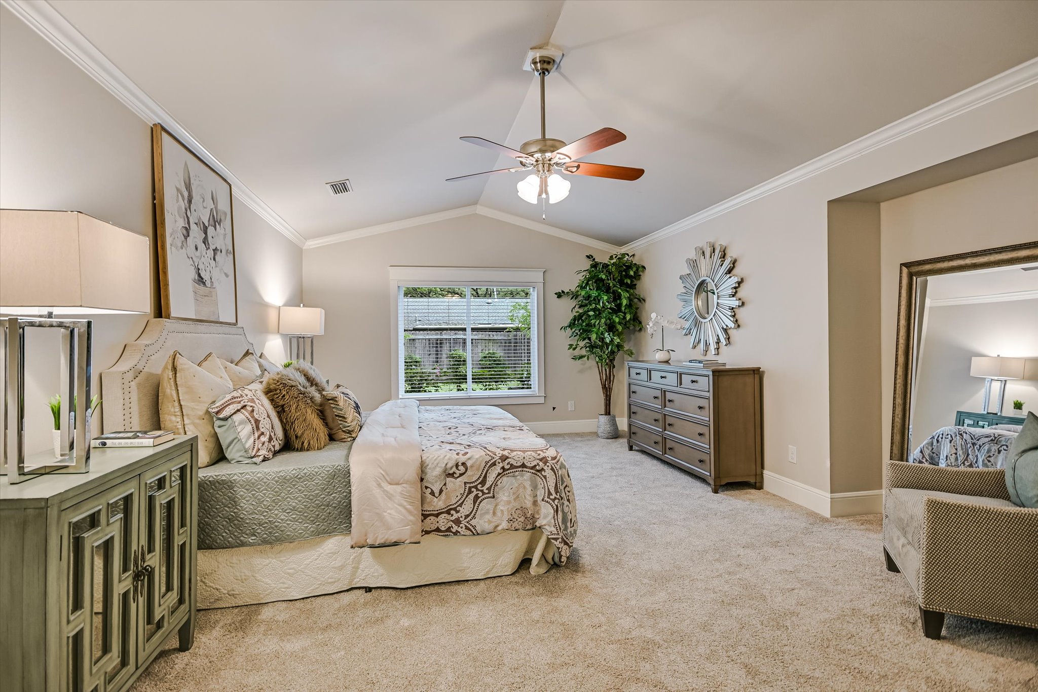 8602 Silver Ridge Drive Austin, TX 78759 - Photo 16 of 40 The spacious primary suite was expanded during the 2013 remodel and features a cathedral ceiling and new carpet (April 2026).