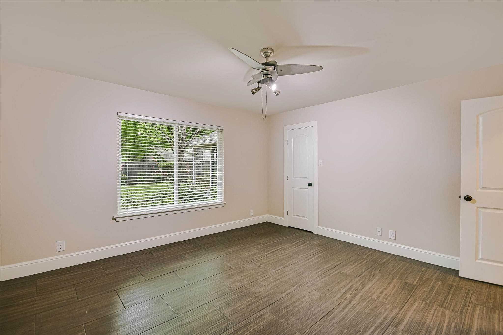 8602 Silver Ridge Drive Austin, TX 78759 - Photo 19 of 40 The secondary bedrooms are generously sized and feature walk-in closets.