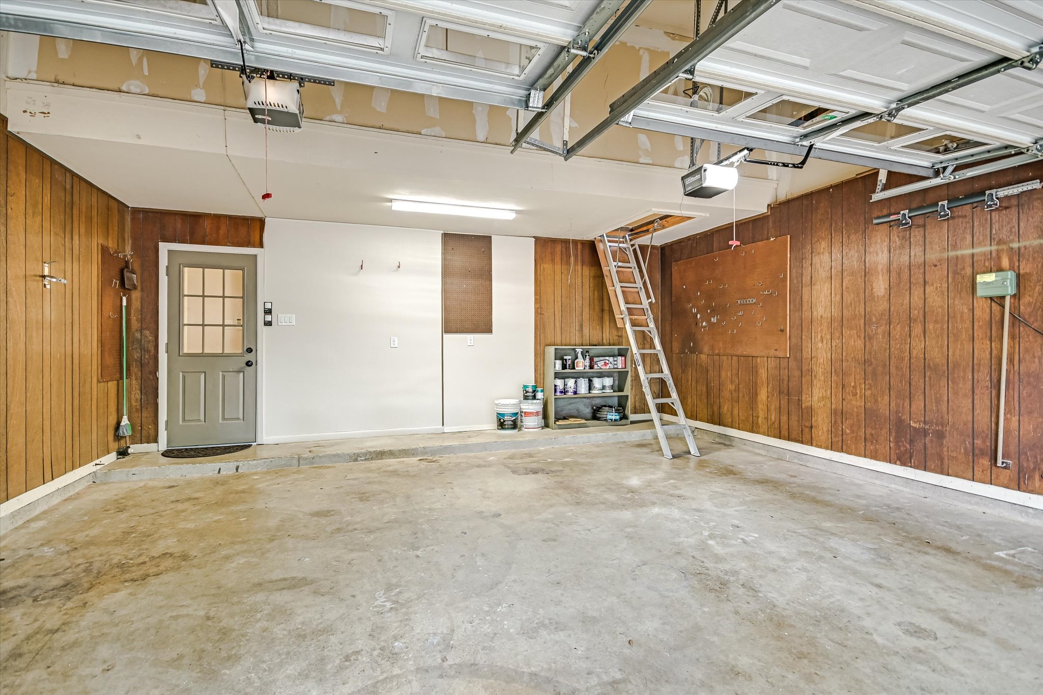 8602 Silver Ridge Drive Austin, TX 78759 - Photo 25 of 40 The loft is conveniently accessed via an attic ladder in the garage.