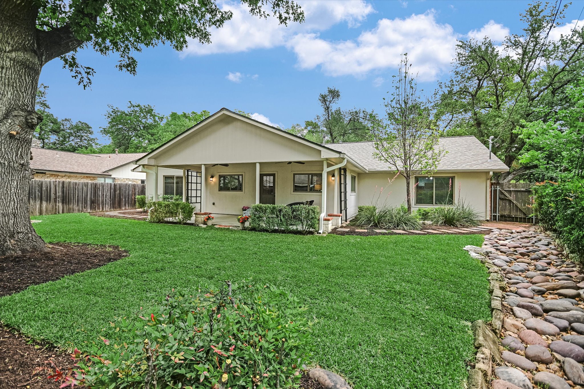 8602 Silver Ridge Drive Austin, TX 78759 - Photo 30 of 40 The spacious yard can be the site for many games, birthday parties, and just general fun.
