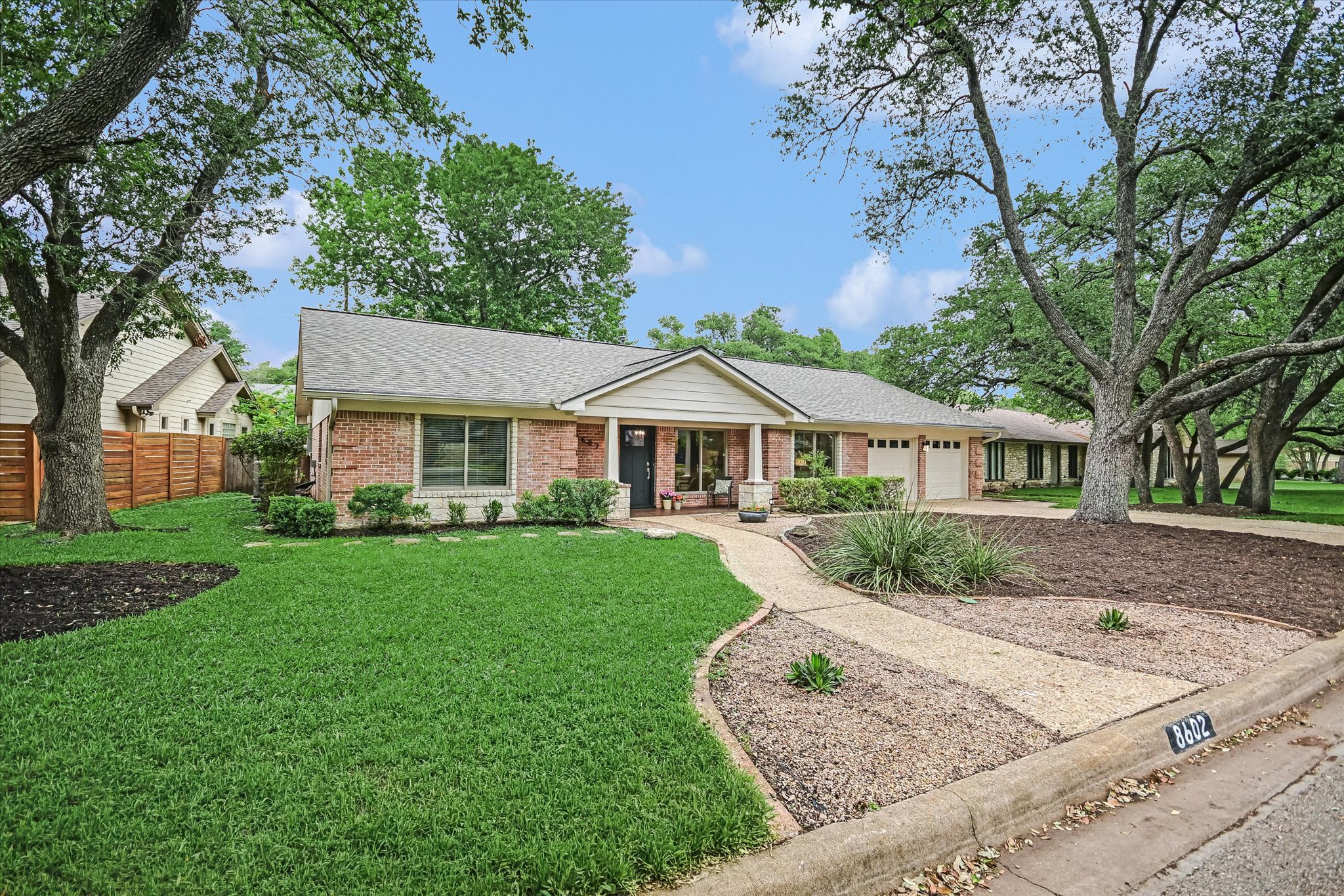 8602 Silver Ridge Drive Austin, TX 78759 - Photo 5 of 40 Andersen windows, installed during the 2013 remodel, enhance the home with both style and quality craftsmanship.