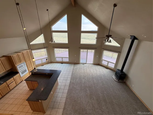 a bathroom with a sink a toilet a tub and shower