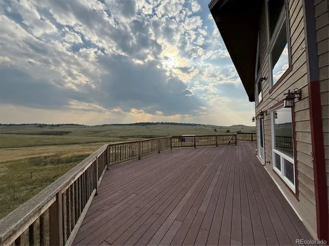 a view of balcony with hardwood floor