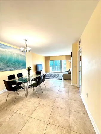 a view of a livingroom with furniture and window