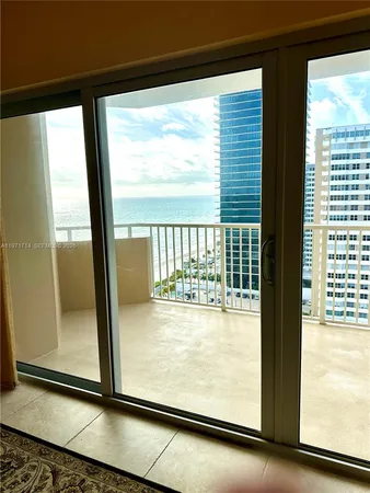 a view of roof with city view