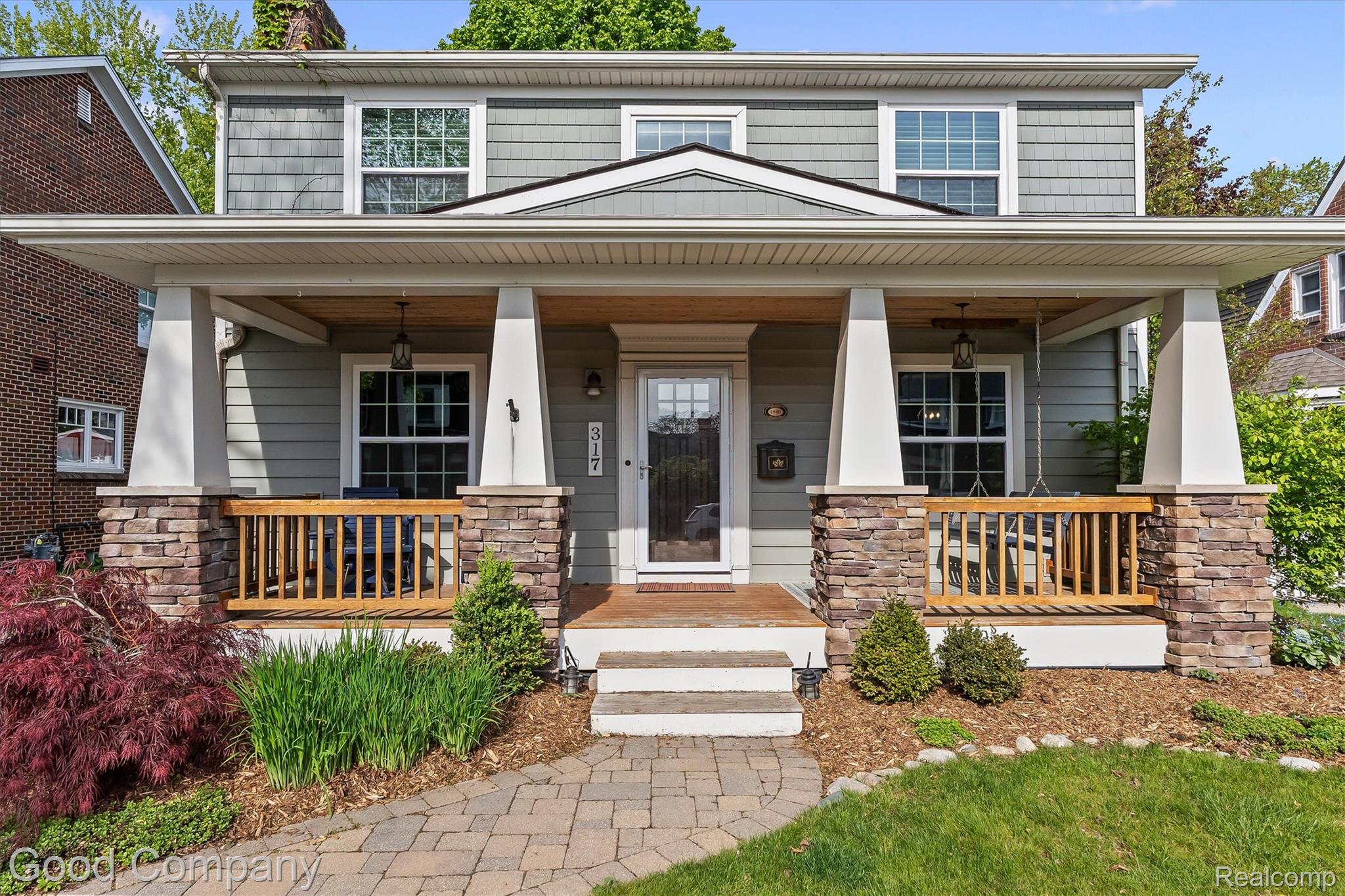 317 Wesley Street Rochester, MI 48307 - Photo 2 of 29 View of front of house featuring a porch and stone siding