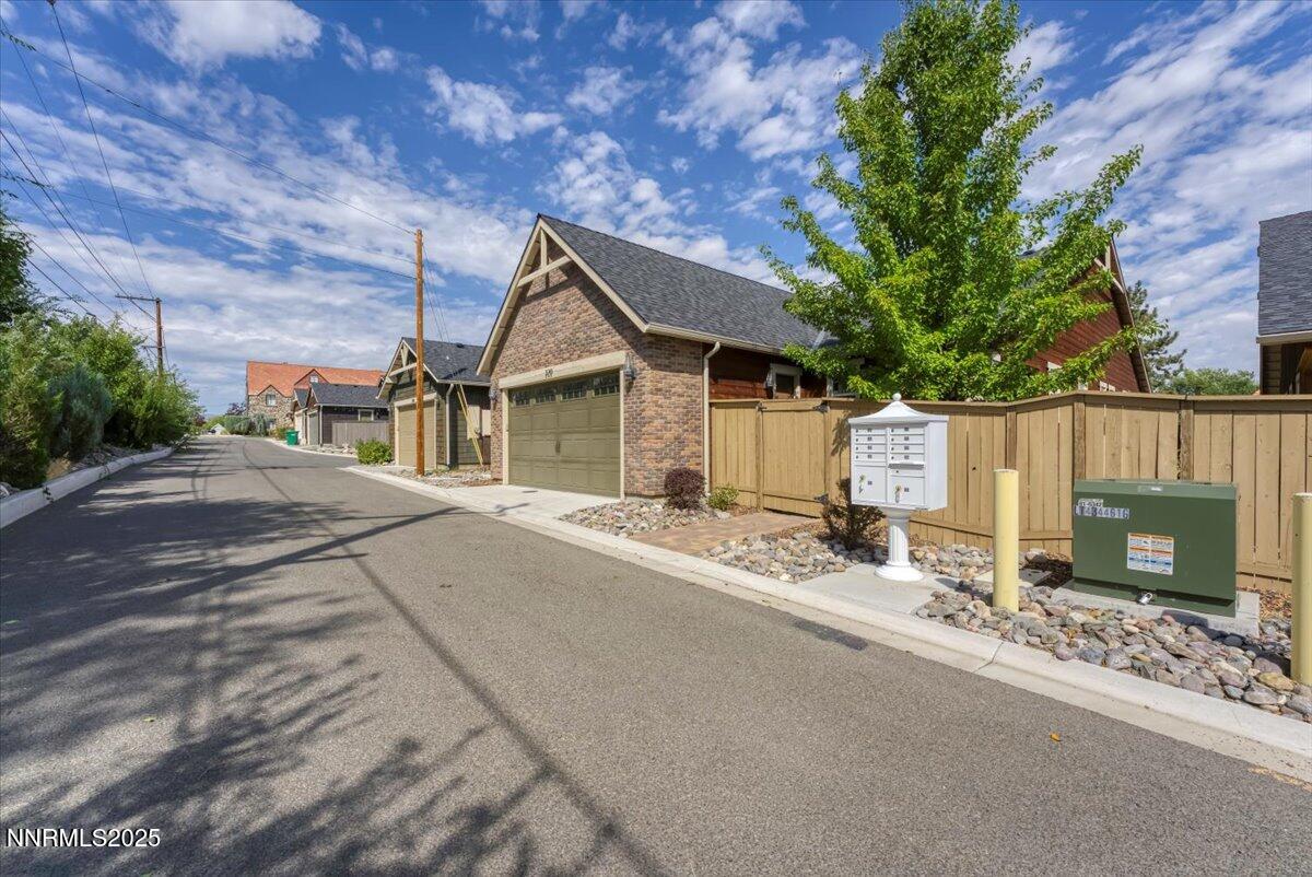 320 Mt Rose Street Reno, NV 89509 - Photo 26 of 32 a white house that has a tree in front of it