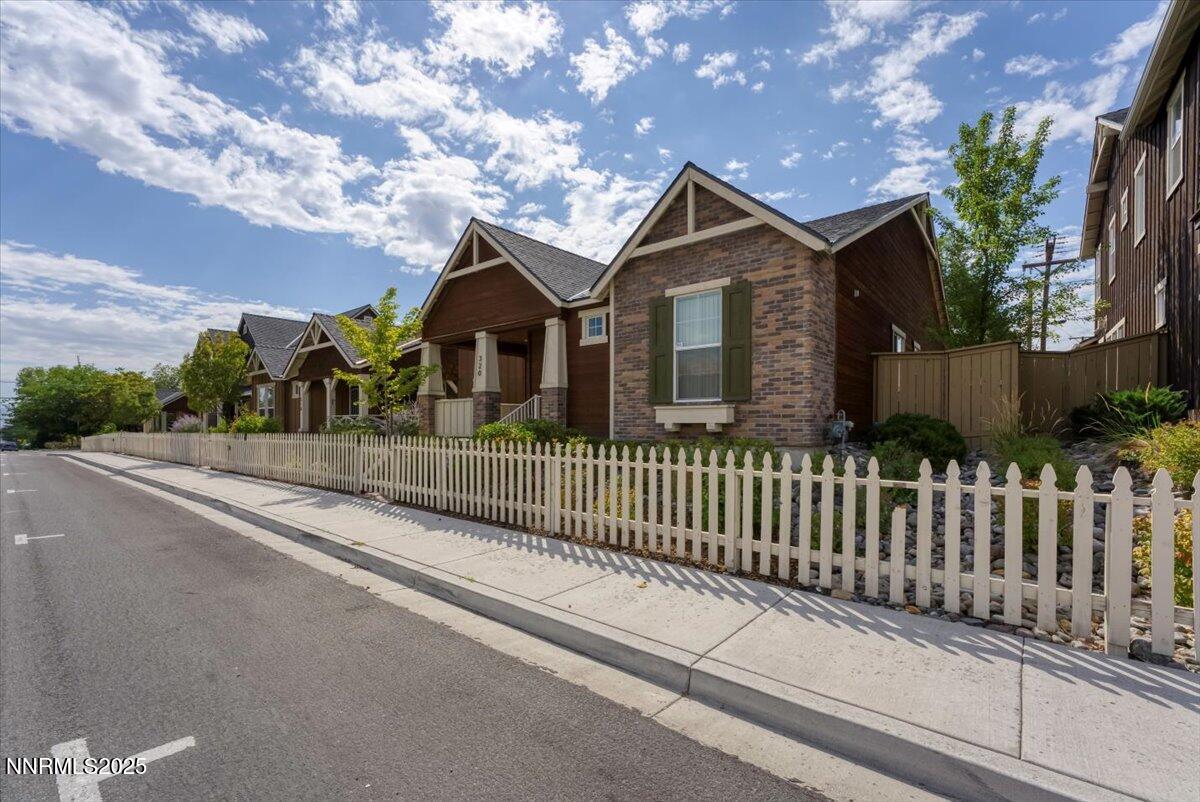 320 Mt Rose Street Reno, NV 89509 - Photo 30 of 32 a front view of a house with a garden