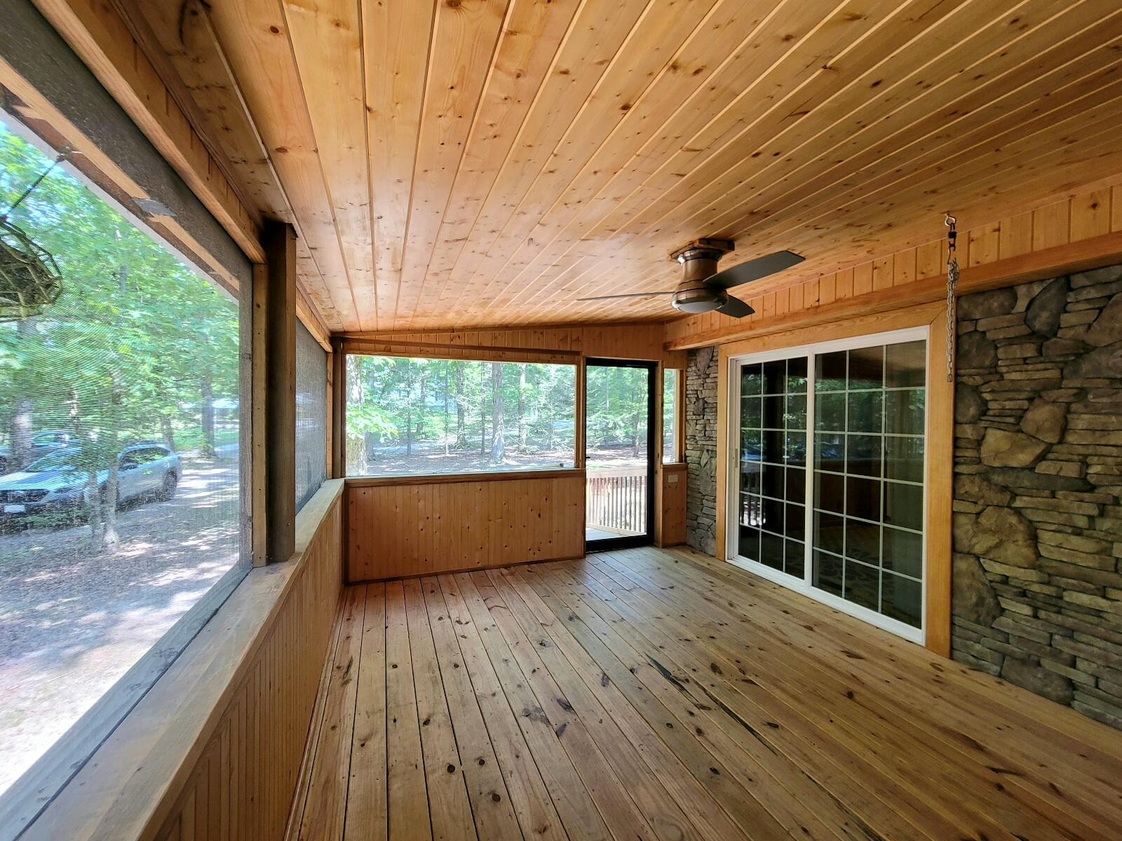 840 Eagle Furnace Road Rockwood, TN 37854 - Photo 13 of 32 a view of a room with wooden floor and city view