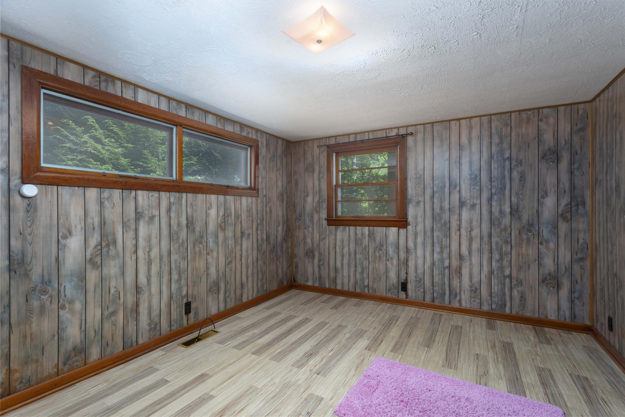 840 Eagle Furnace Road Rockwood, TN 37854 - Photo 21 of 32 a view of an empty room with wooden floor and a window