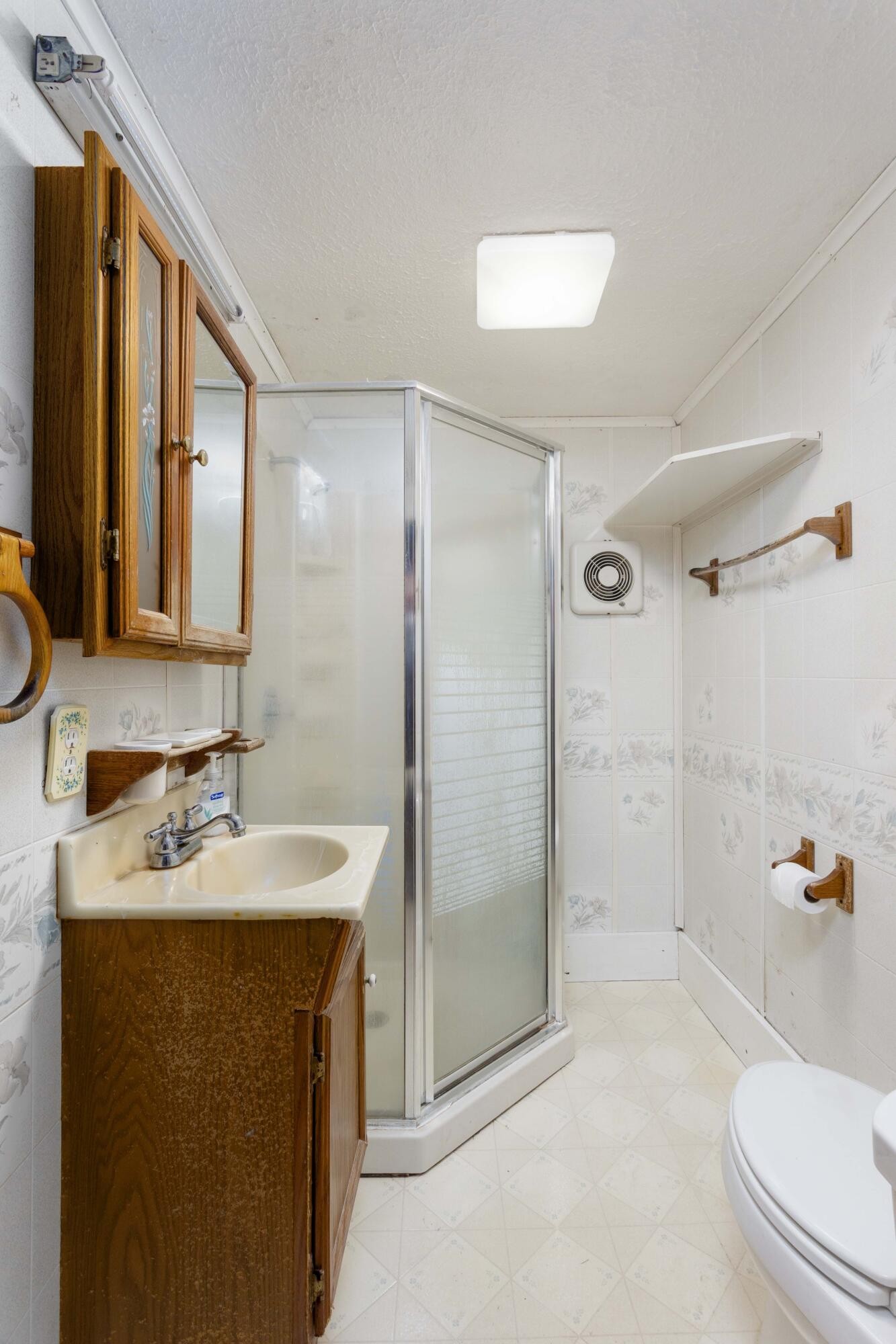 840 Eagle Furnace Road Rockwood, TN 37854 - Photo 23 of 32 a bathroom with a sink toilet and shower