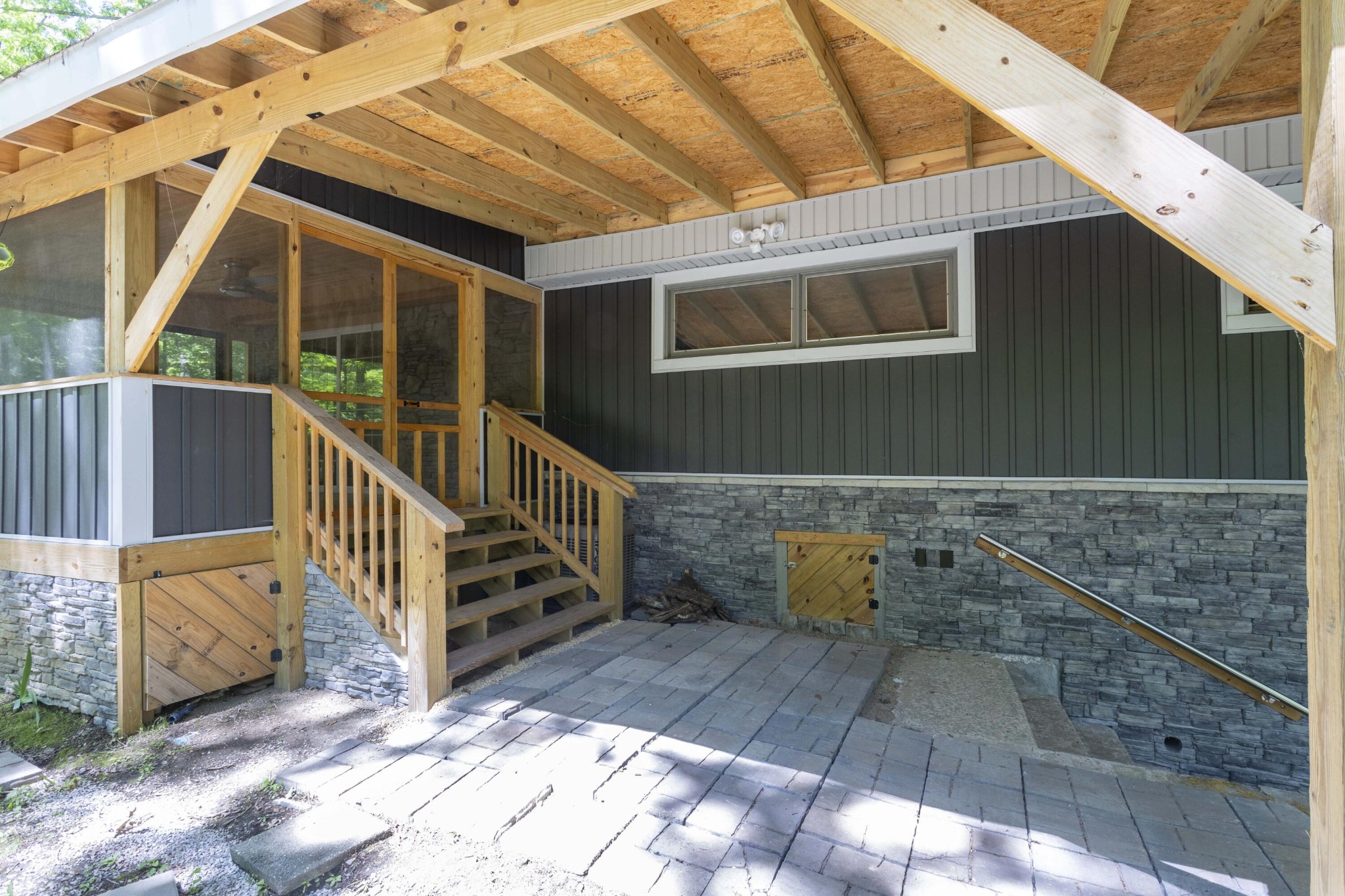 840 Eagle Furnace Road Rockwood, TN 37854 - Photo 25 of 32 a view of a deck with two couches and wooden floor