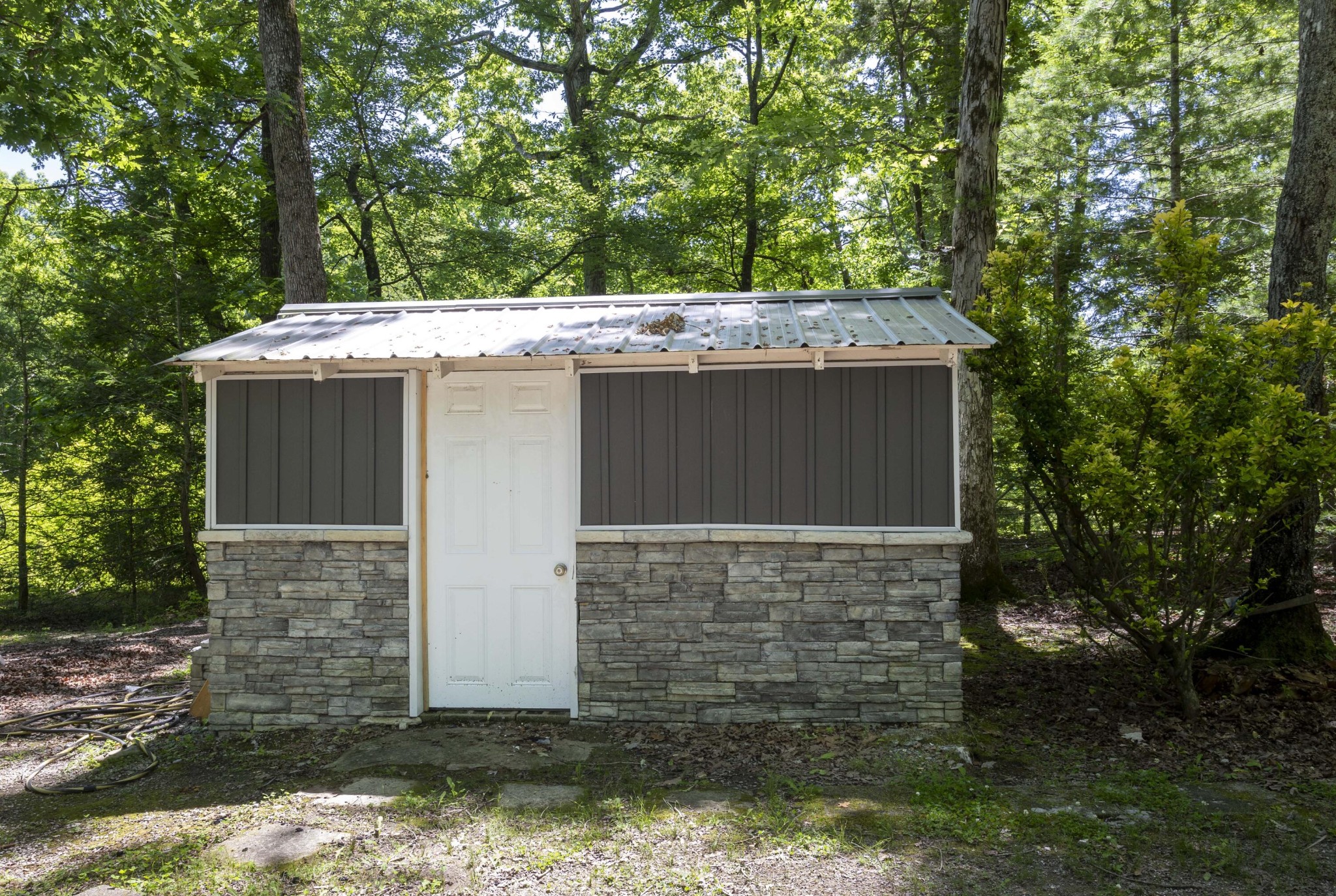 840 Eagle Furnace Road Rockwood, TN 37854 - Photo 28 of 32 a view of house with trees in the background
