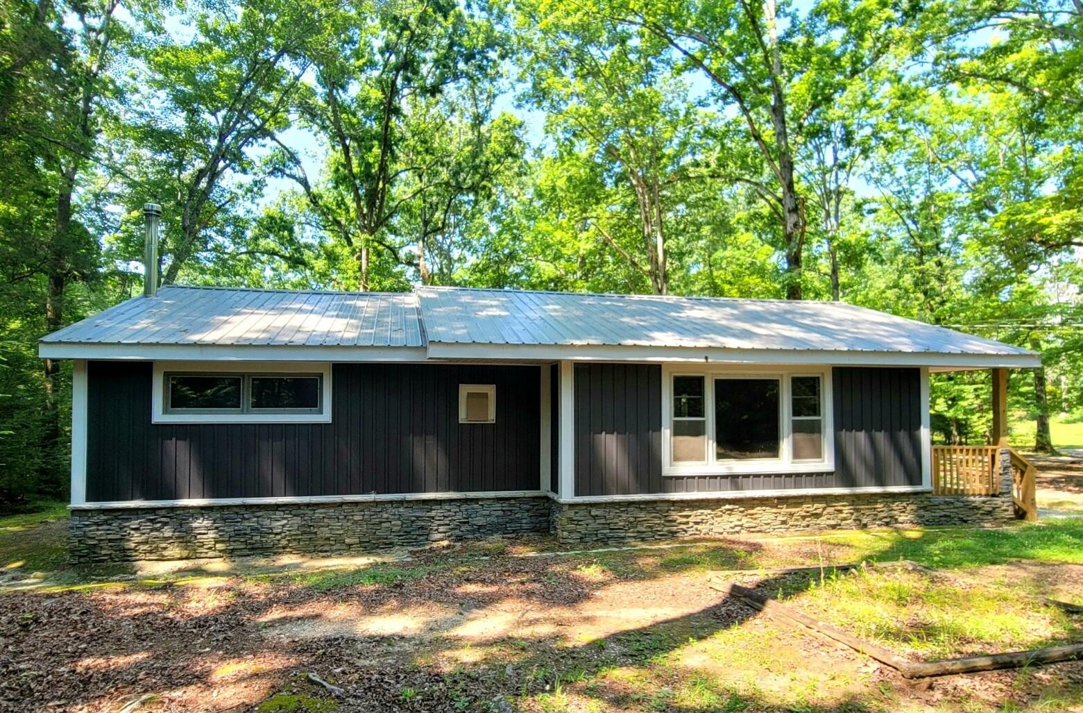 840 Eagle Furnace Road Rockwood, TN 37854 - Photo 32 of 32 a view of a house with a yard