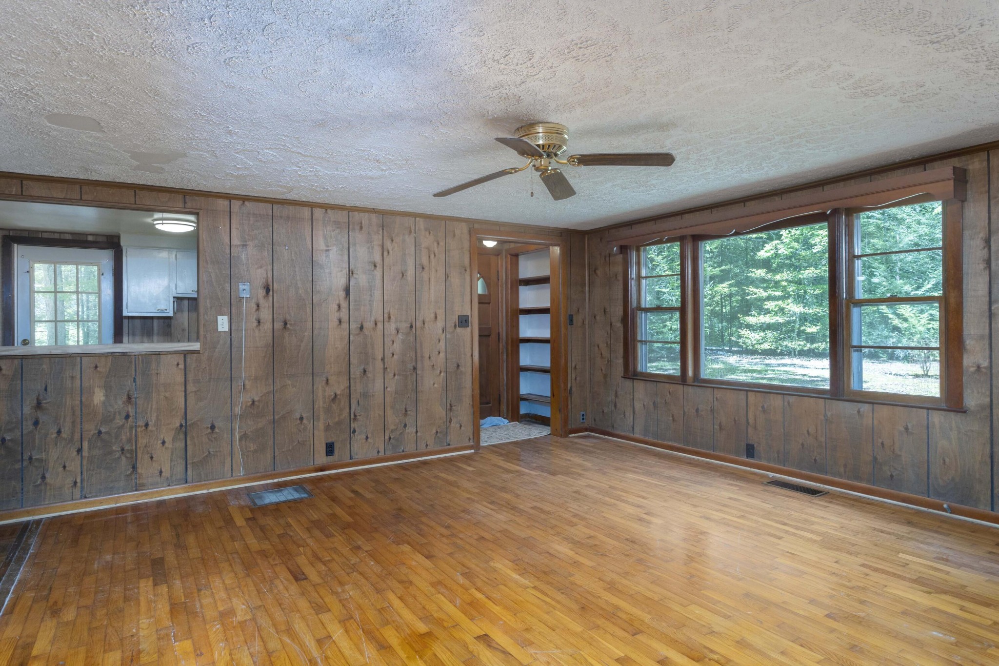 840 Eagle Furnace Road Rockwood, TN 37854 - Photo 7 of 32 a view of an empty room with a window and wooden floor